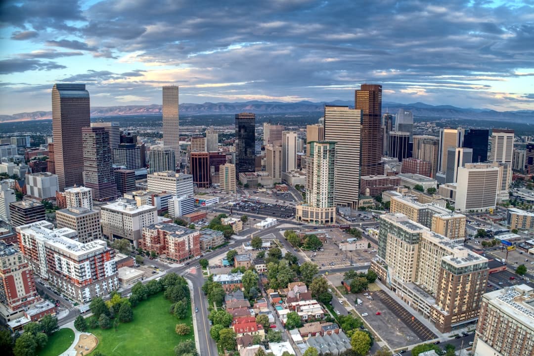 Denver Colorado skyline with the Rocky Mountains behind