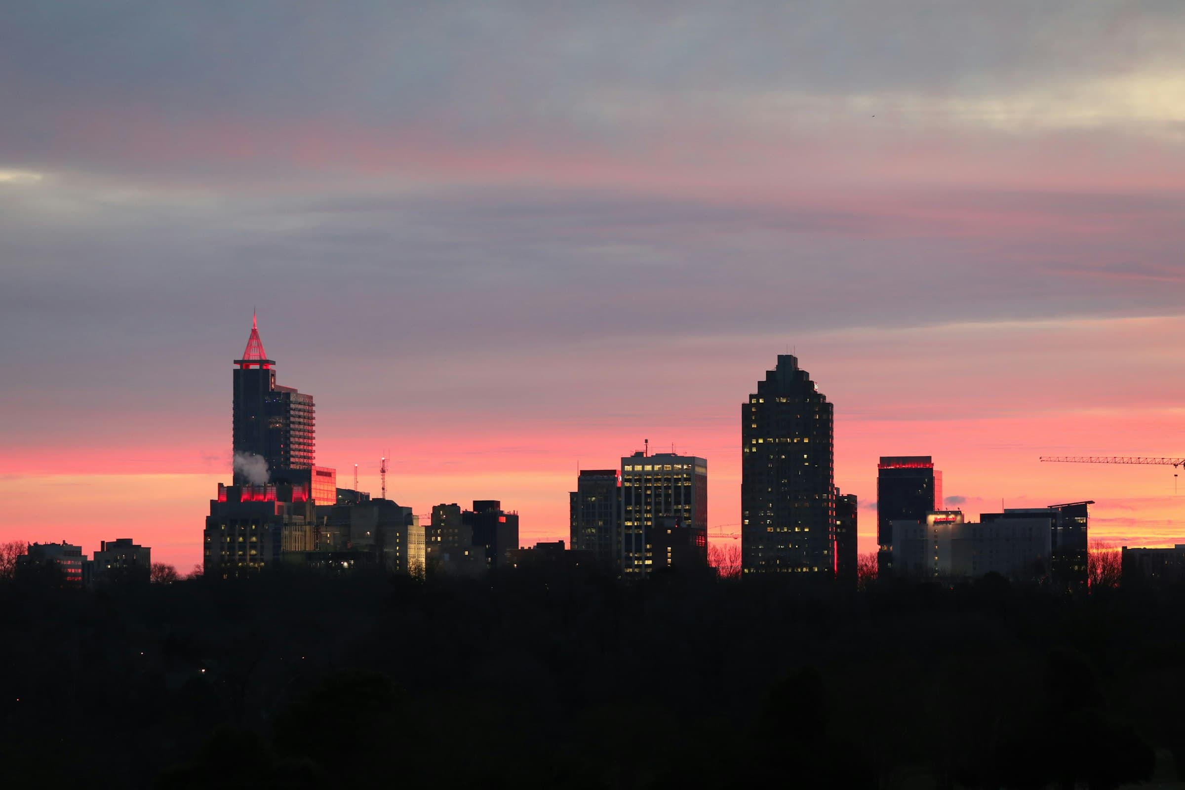 Raleigh, North Carolina city skyline at sunset